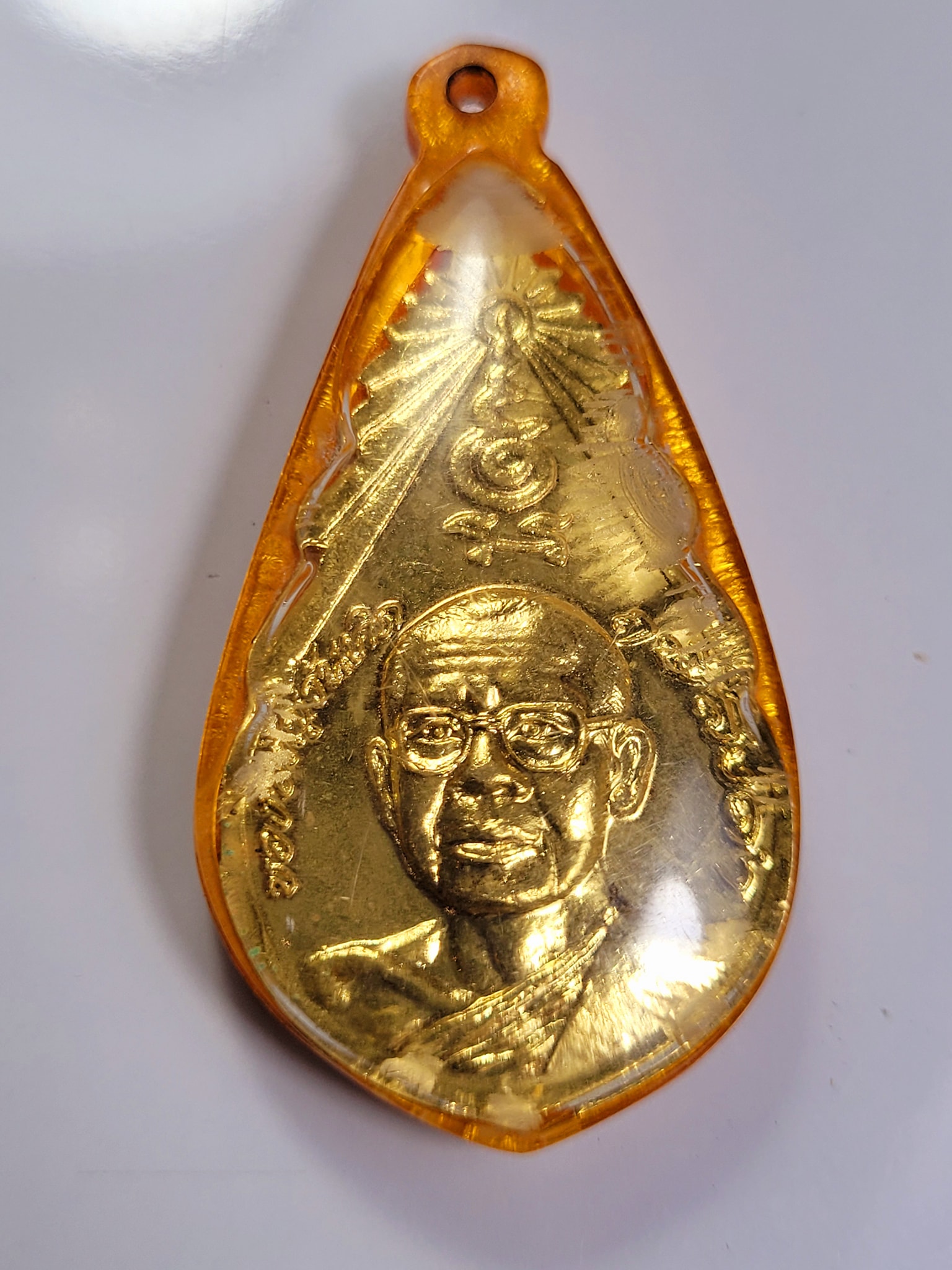 เหรียญของขวัญวันเกิดรุ่นแรก(เลี่ยมเดิมวัด)